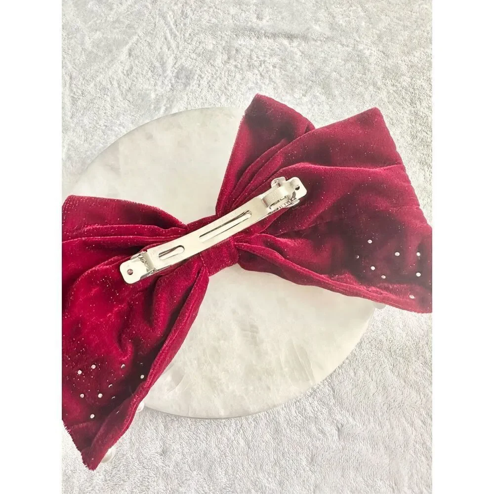 Deep red holiday hair bow with sparkle and pearl embellishment ￼ - Picture 5 of 5